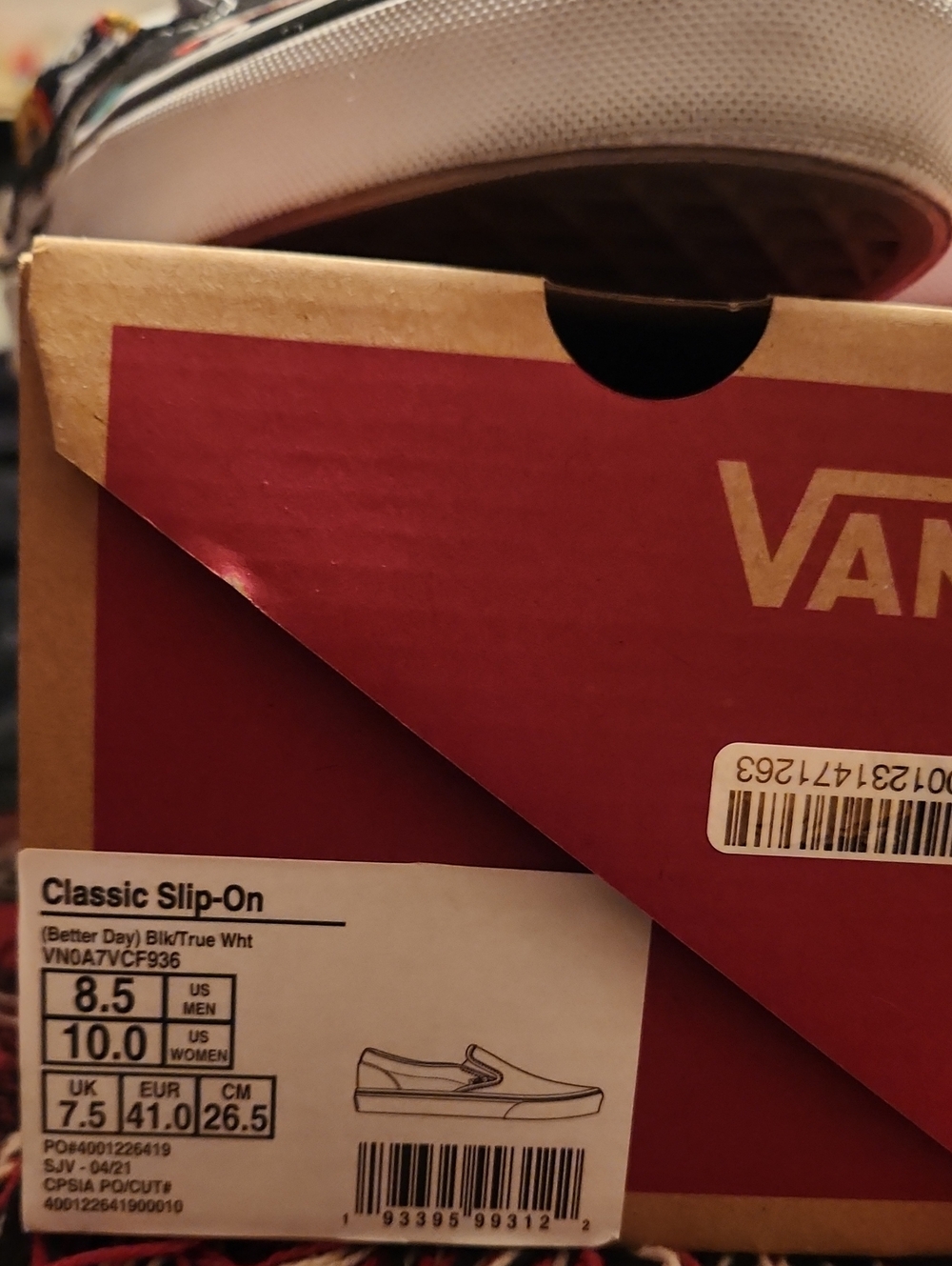 Vans Black Slip-On Sneakers with Yellow & Blue Smiley Pattern - Picture 2 of 5